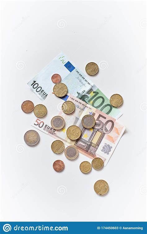 Calculation Of Expenses 100 And 50 Euro Banknotes With Coins Top View