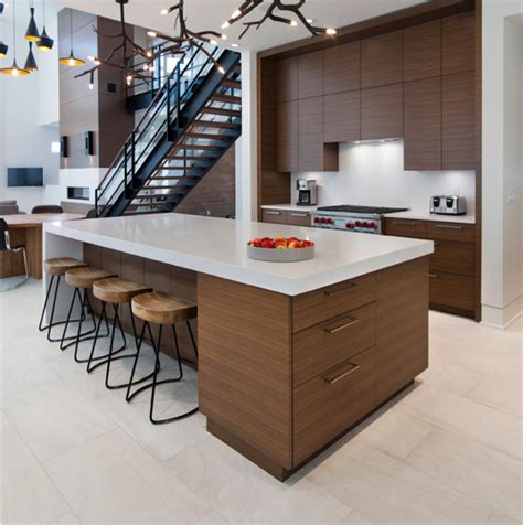 Modern Kitchen With Streamlined Cabinetry Hidden Storage And Island