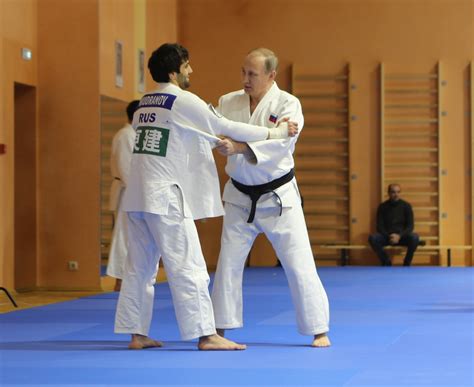 Try it now free at. lol Putin got floored, possibly hurt by WOMAN at Judo ...