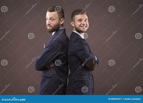 Two Men Standing Back To Back Stock Image Image Of Confidence People