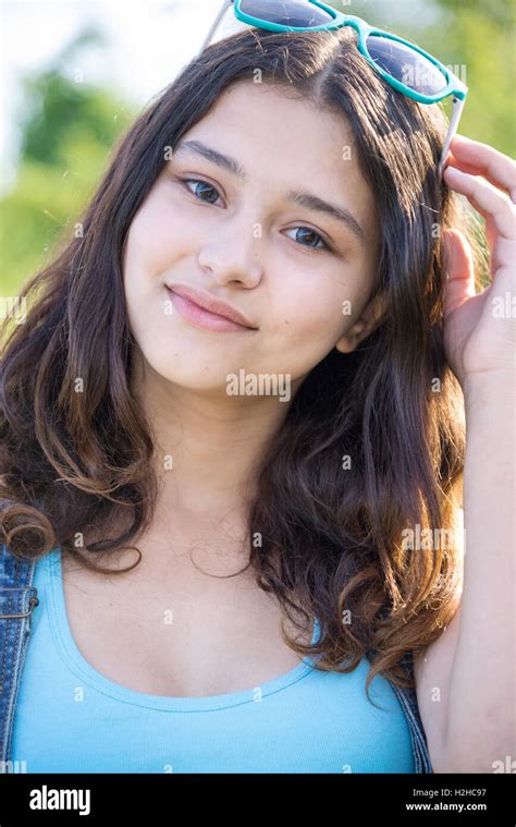 Portrait Of Beautiful Teen Girl With Sunglasses On Head Stock Photo Alamy