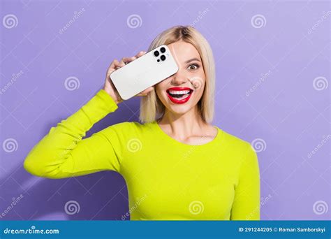Photo of Impressed Girl Wear Stylish Yellow Shirt Smartphone Cover Eye