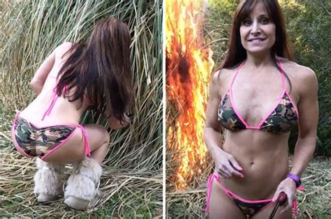 Sexy Older Woman Strips Off Before Lighting Fire To Warm