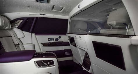 This Rolls Royce Phantom Has A Purple And White Interior With A