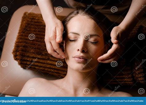 Neck And Face Massage In The Spa Masseur Is Making Facial Beauty Treatments For An Attractive