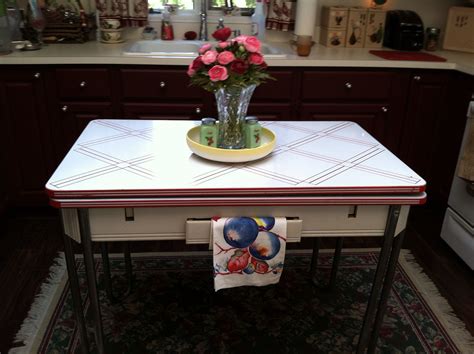 Country Inspired Vintage Kitchen With Enamel Table From The 40s
