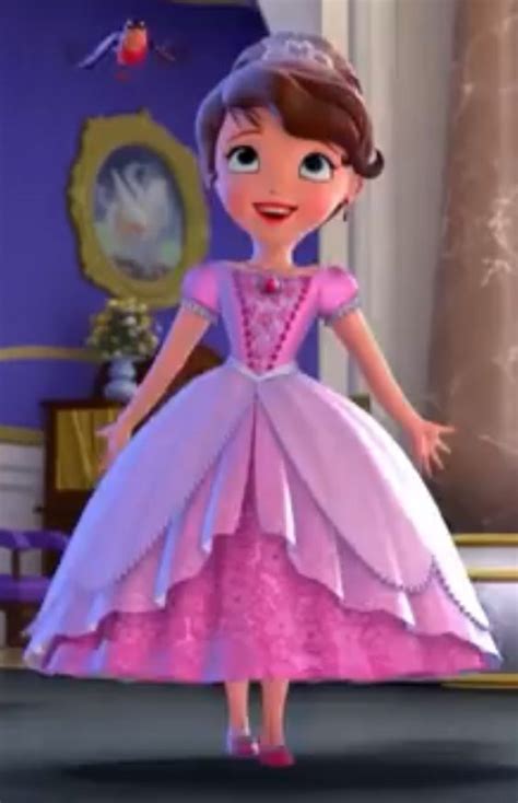 The Princess In Her Pink Dress Is Standing