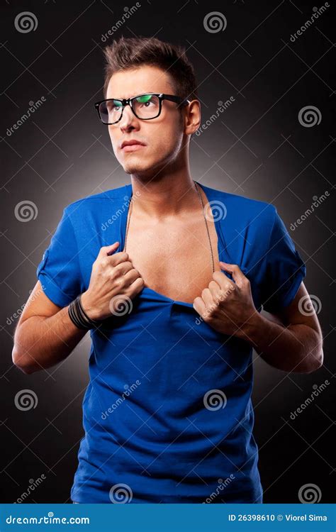 Young Man Ripping His Blue Shirt Stock Photo Image 26398610
