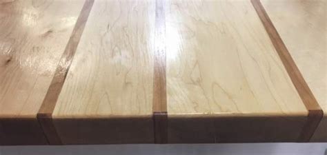 In the solid wood face, the piece was first passed over a jointer. Maple Table Top with Cherry Inlays » Windsor Plywood®