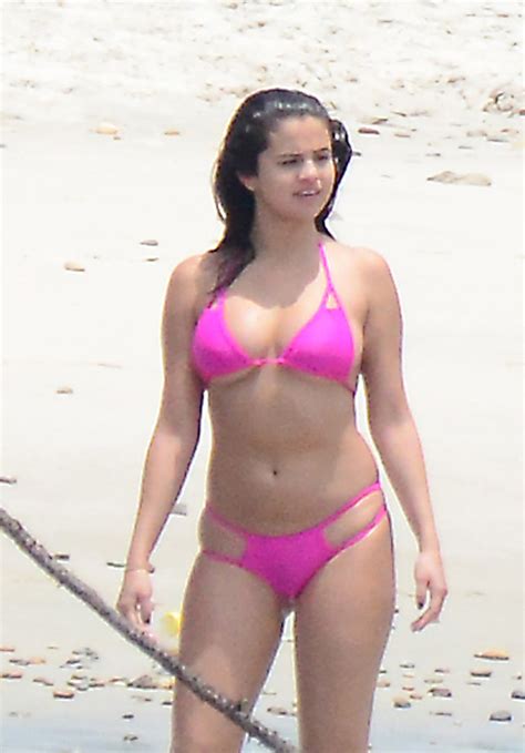 Exclusive Selena Gomez Shows Off Her Figure In A Pink Bikini In