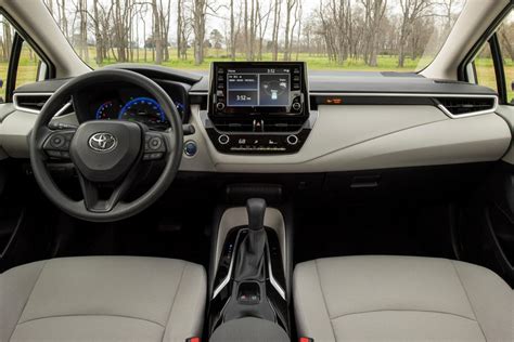 2021 Toyota Corolla Hybrid Review Trims Specs Price New Interior