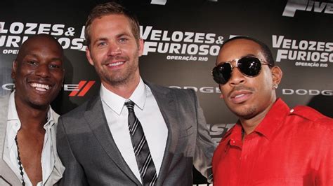 fast and furious 7 tyrese gibson celebrates with paul walker s brothers as film wraps