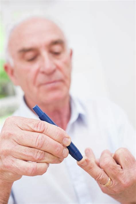 Man Testing Glucose Photograph By Science Photo Library Pixels