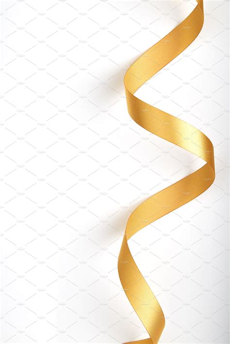North america is the leading importer of these interestingly characteristic products. Gold ribbon on a white background. | High-Quality Stock Photos ~ Creative Market