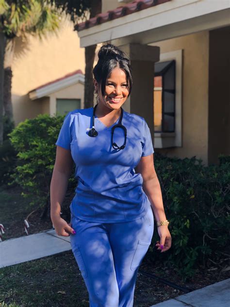 Black Female Nurse In Blue Scrubs Beautiful Nurse