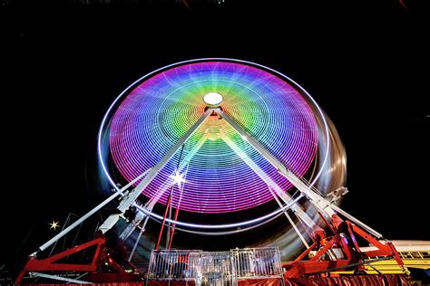 Night Time Rainbow Colored Ferris Wheel Photograph By Michael Mcdonald
