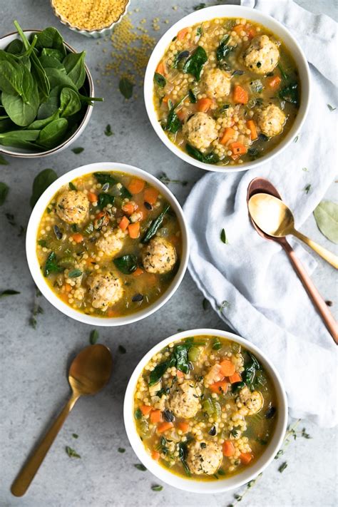 Vietnamese chicken meatball and noodle soup. Mini Meatball Chicken Noodle Soup with Veggies, Spinach ...
