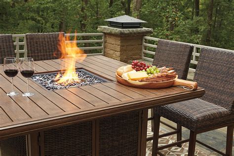 Backyard with fire pit in the middle enjoy your evenings outside by lounging around a belgian fire ring. Paradise Trail Outdoor Fire Pit Bar Table Set Signature ...