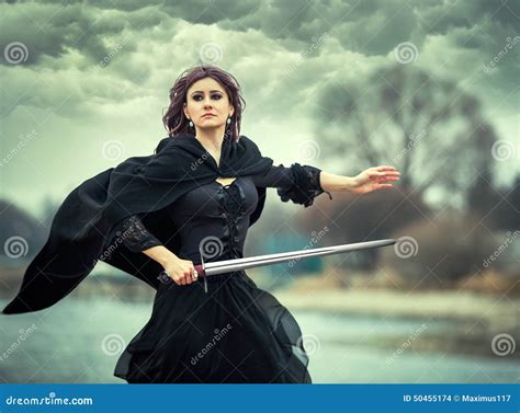 The Beautiful Gothic Girl With Sword Stock Photo Image Of Evil