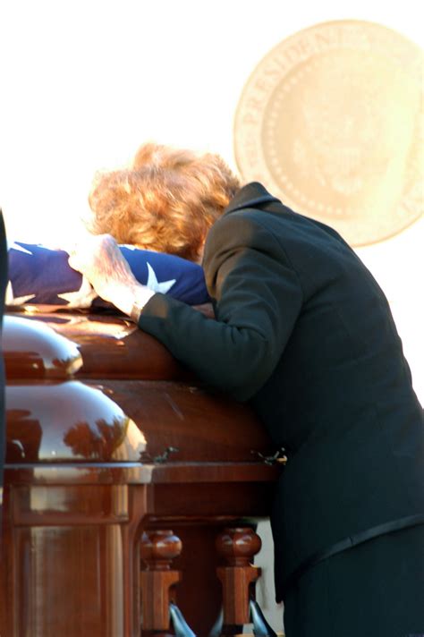 Former First Lady Nancy Reagan Lays Her Head On The Coffin Of Her Late Husband Former Us