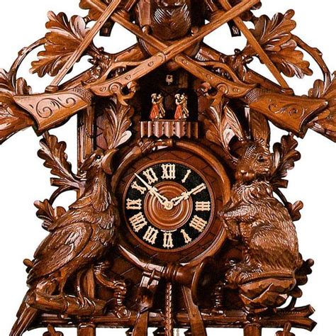 Carved 8 Day Hunting Style Musical Cuckoo Clock With Stag Head Rifles