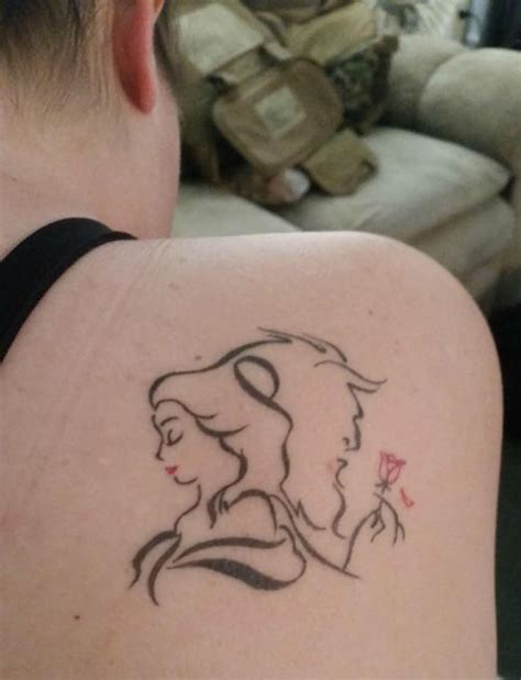 One of the most central images from the film is a rose encased in glass, which has become some of the most popular tattoo imagery surrounding the disney source: 12 Epic Beauty and the Beast Tattoo Ideas - Tattoo.com