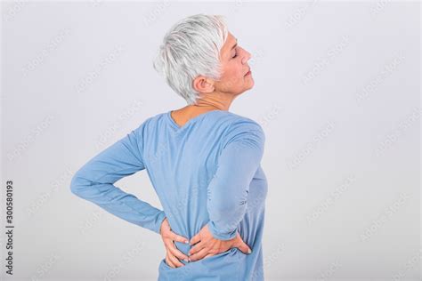 Matur Woman Suffering From Lower Back Pain Mature Woman Resting With