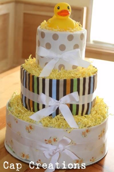 Learn how to make an adorable and practical diaper cake. Cap Creations: DIY Diaper Cake