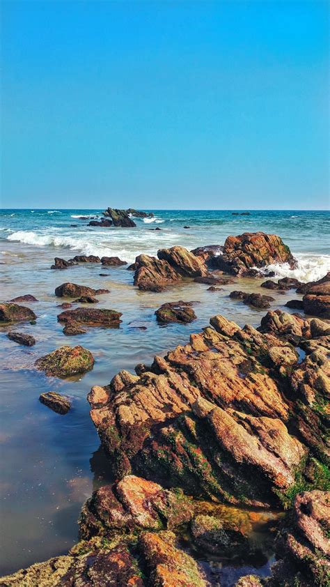 Lucky are those who get to experience this coastal beauty! A colourful rocky beach side in Visakhapatnam India ...