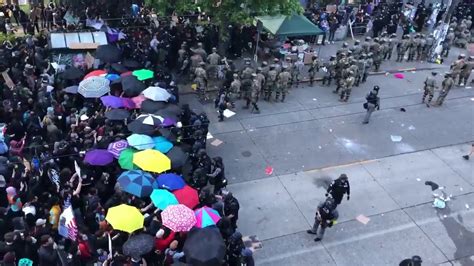 Protesters With Colorful Umbrellas Forcing Riot Cops To Retreat In
