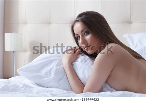 Beautiful Topless Girl Posing Hugging Pillow Stock Photo