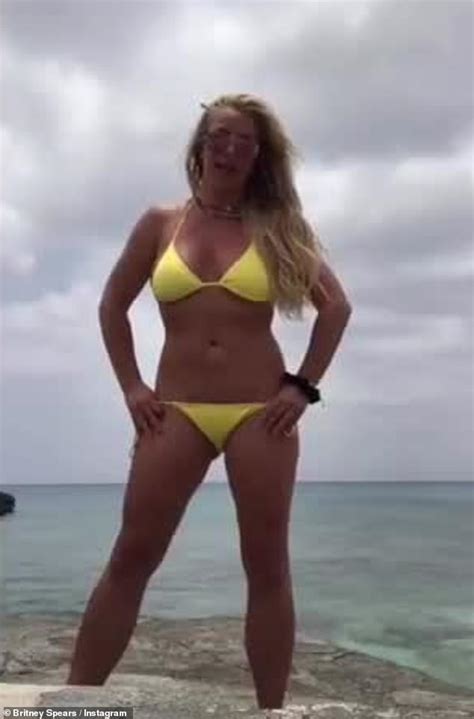 britney spears showcases fit and toned physique in skimpy bikini during visit