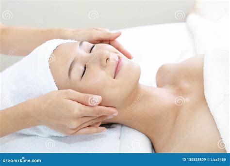 Beautiful Young Woman Receiving Facial Massage Stock Image Image Of Happy Beautiful 135538809