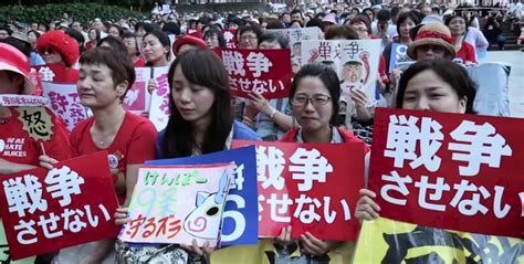 Despite Protests Japans Ruling Coaltion Rams Through Controversial