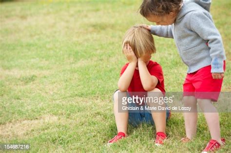 Young Child Comforting Sad Young Friend High Res Stock