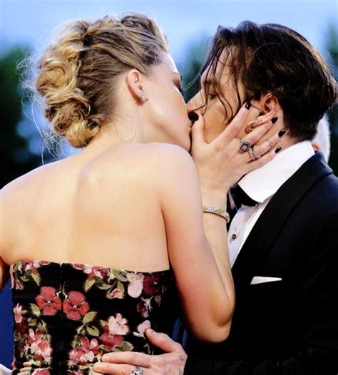 Amber Heard And Johnny Depp Kiss At ‘the Danish Girl Premiere During The 72nd Venice Film