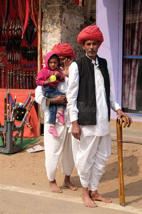 Rajasthani Men Wearing Traditional Red Turban In The Sacred Town Of