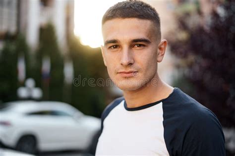 Portrait Of Handsome Young Casual Man Walking On The Street Stock Image