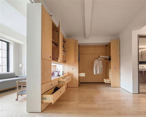 Small Studio Apartment With A Moving Wall Brilliant Design