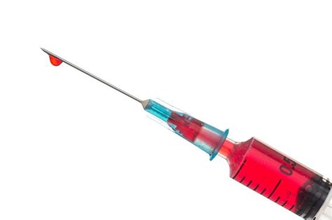 Premium Photo Blood Filled Syringe