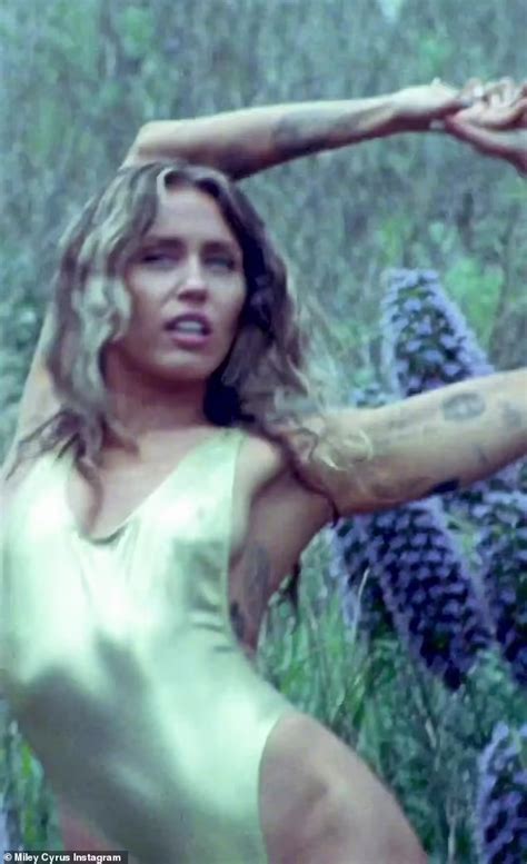 Miley Cyrus Stuns In Revealing Gold Swimsuit And Sends Fans A