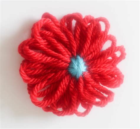 How To Make A Yarn Flower With A Flower Loom