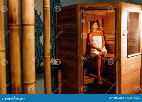 Beautiful Woman Wrapped In White Towel Takes A Wooden Sauna Stock Image Image Of Beautiful