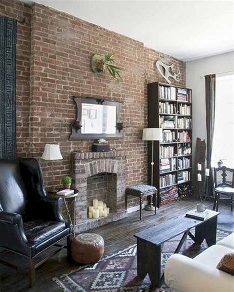The ceiling is white stucco with dark beams and the the molding is stained brown and the floor is pergo red mohagany. Brick Wall Living Room Ideas 4 - DECORATHING