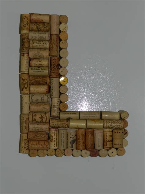 Crafty thing to do with corks. Used cardboard L from Joannes and hot