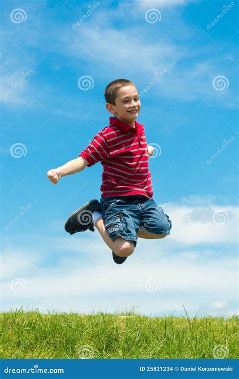 Kid Jumping High Outdoors Stock Photo Image Of Laughing 25821234