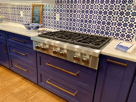 These modern metal cabinet are trendy and reinforced. Kitchen Cabinet Gallery - Geneva Cabinet Company, LLC ...