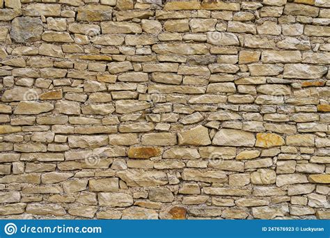 Rough Textured Natural Stone Wall Surface Background Or Backdrop Stock
