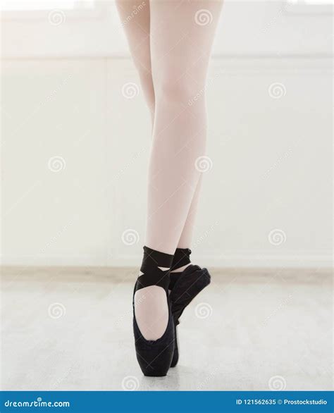 Ballerina In Pointe Shoes Graceful Legs Ballet Background Stock Image