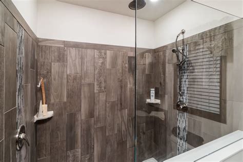 When tiling a shower you have to keep a few important things in mind. 7x20 Vertical Tile Showers | Commodore of Indiana